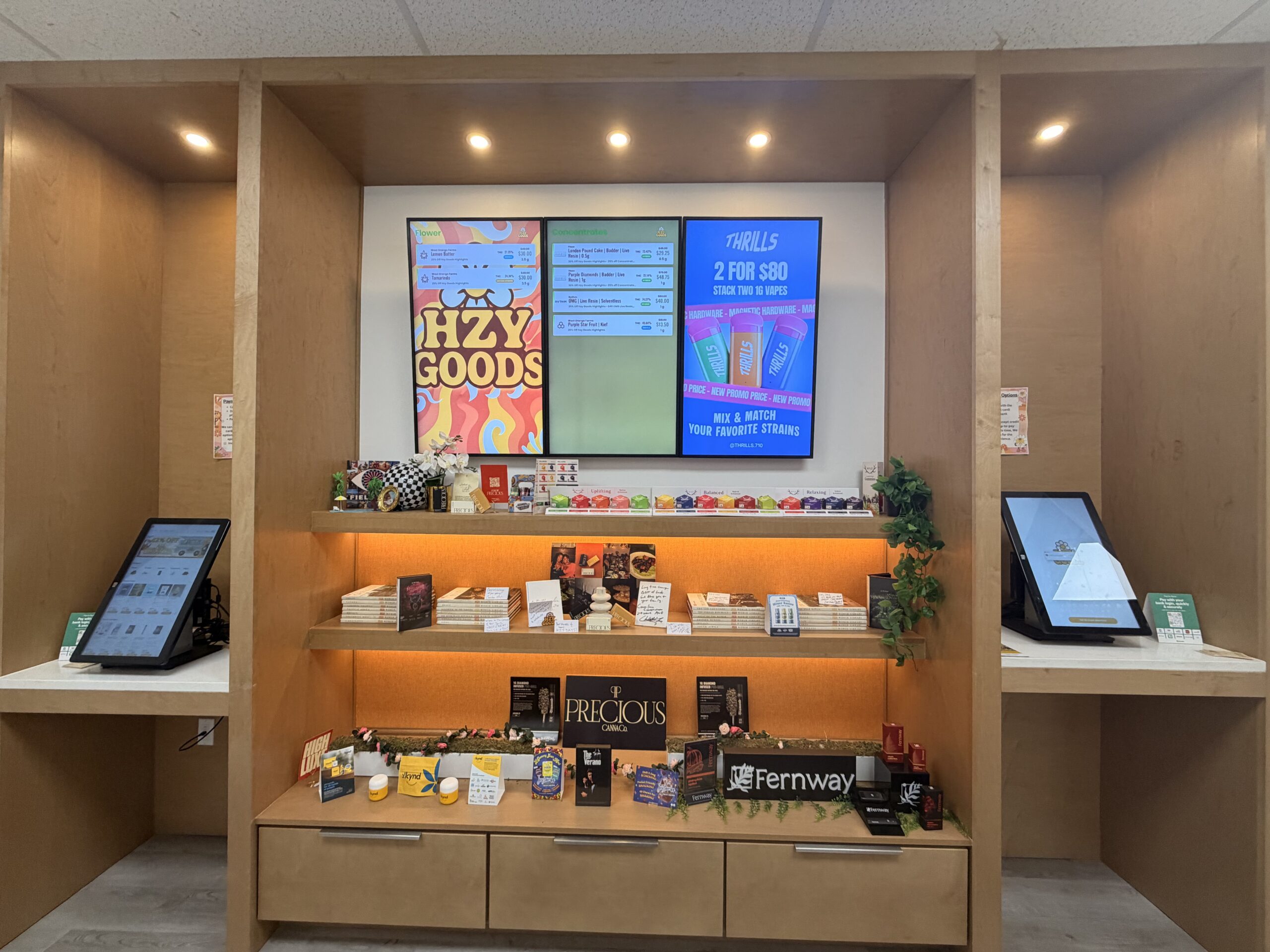 HZY Goods cannabis dispensary interior with two self-service ordering kiosks in East Orange NJ